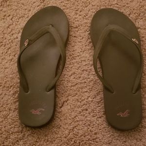 Brown Hollister flip flops